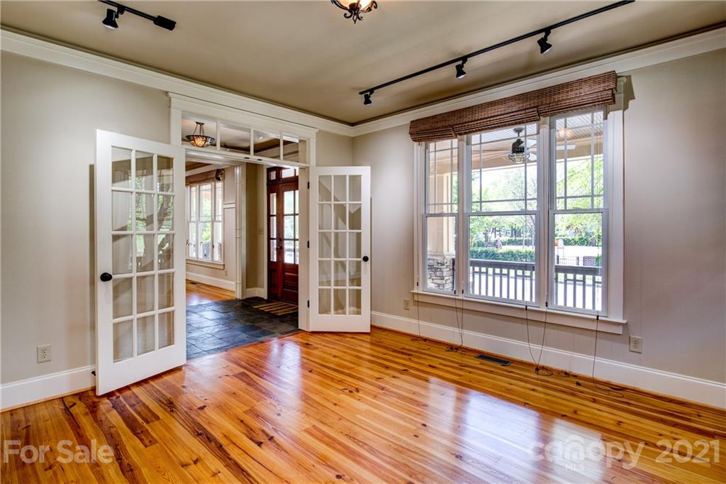797 Shady Grove Crossing Fort Mill, SC 29708 - Photo 34 of 35 a view of an empty room with wooden floor and a window