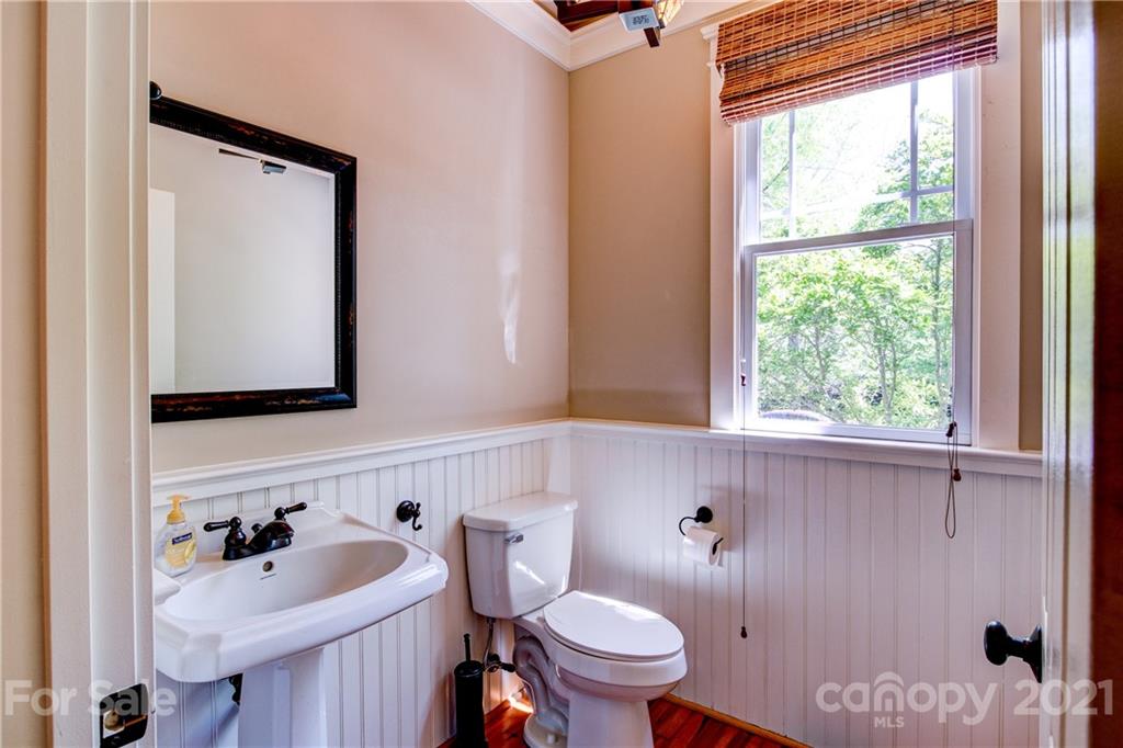 797 Shady Grove Crossing Fort Mill, SC 29708 - Photo 10 of 35 a bathroom with a sink mirror toilet and window