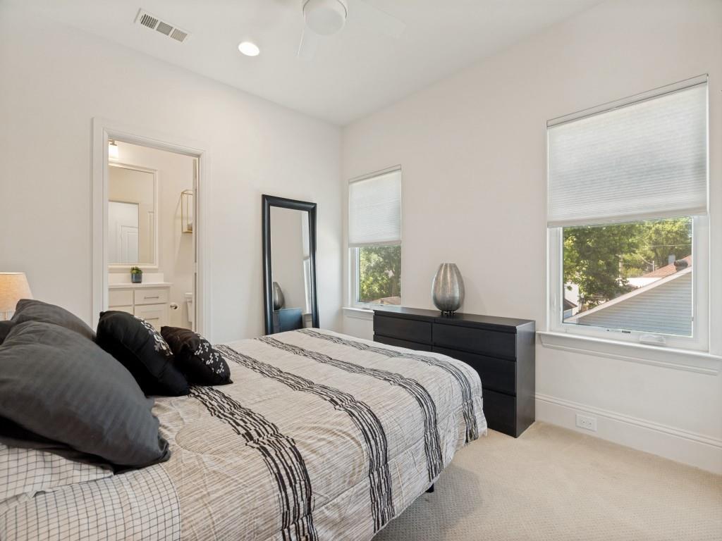 732 West 7th Street Dallas, TX 75208 - Photo 21 of 25 Carpeted bedroom featuring white walls, recessed lighting, and a ceiling fan