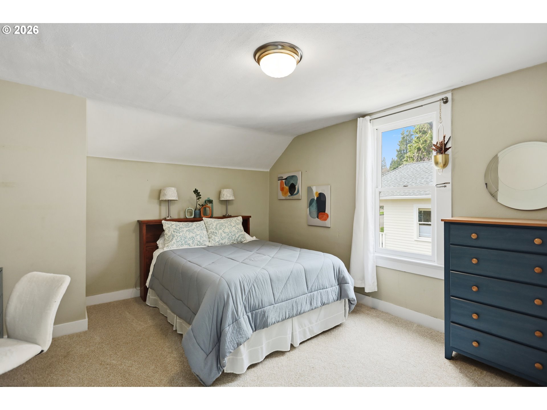 1028 Cascade Avenue Hood River, OR 97031 - Photo 17 of 33 a bedroom with a bed and a cabinets