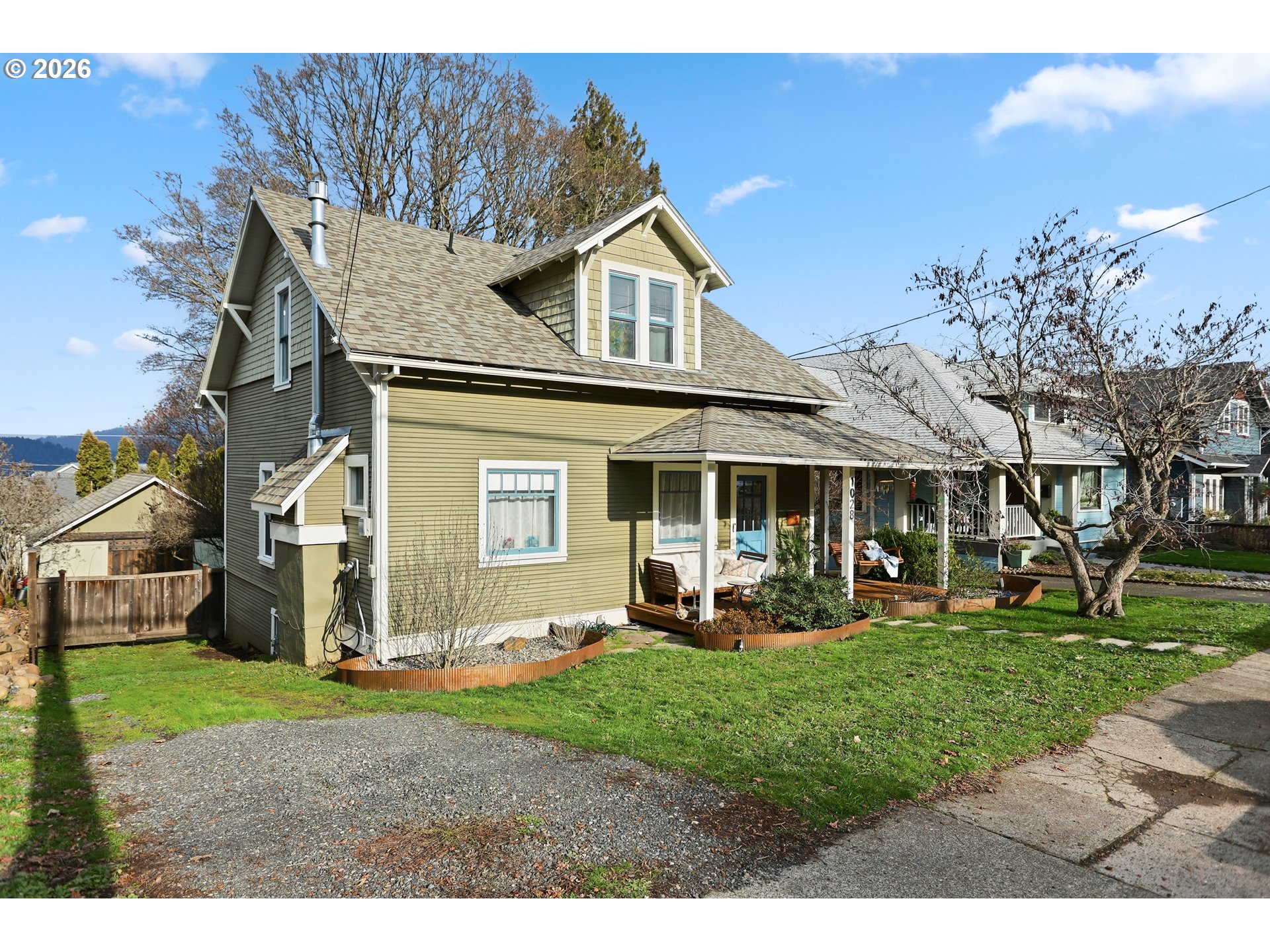 1028 Cascade Avenue Hood River, OR 97031 - Photo 2 of 33 a front view of a house with a yard