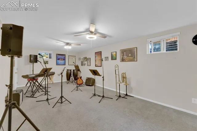 a view of a livingroom with furniture and a table