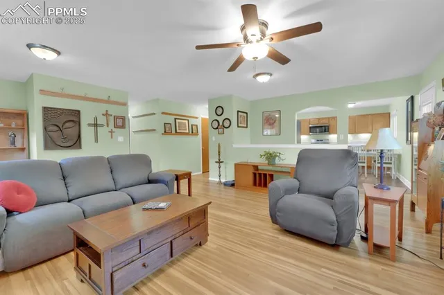 a view of an entryway of house and wooden floor