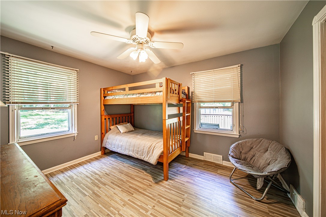 34505 Cannon Road Solon, OH 44139 - Photo 12 of 34 Hardwood floored bedroom with ceiling fan