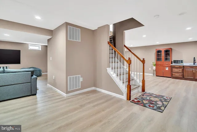 a view of livingroom with furniture and wooden floor