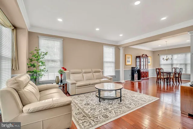 a living room with furniture and a table