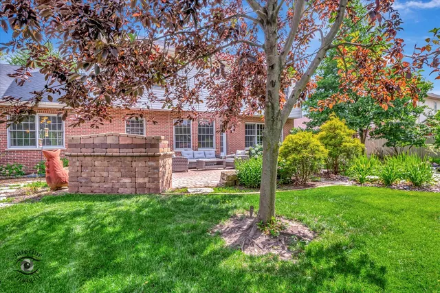 a backyard of a house with lots of green space