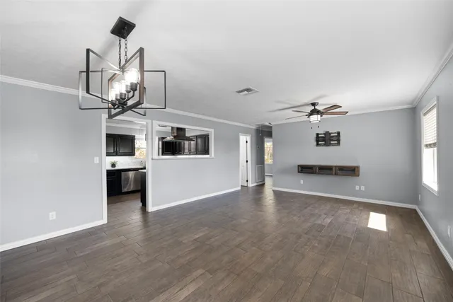 a view of a livingroom with a kitchen