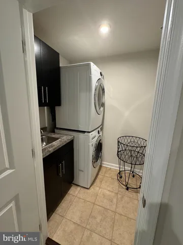 a room with cabinets and dust bin