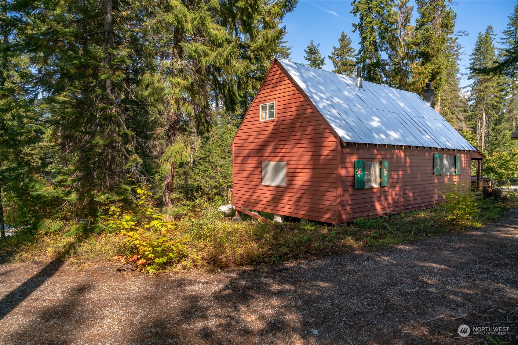 15231 Cedar Brae Road Leavenworth, WA 98826 - Photo 22 of 24 a view of a house with a yard