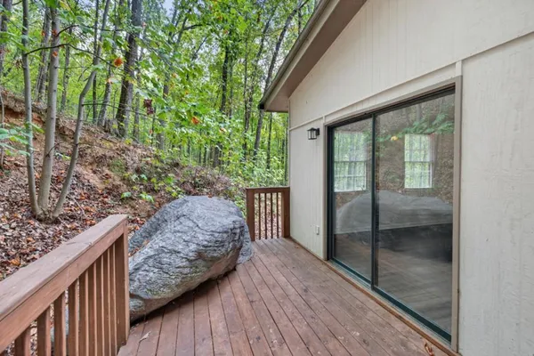 a backyard of a house with lots of green space and garden view