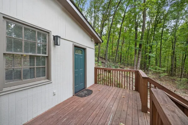 a view of deck with wooden floor and fence