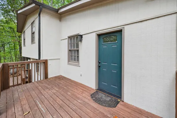 a view of a house with wooden floor and a sink