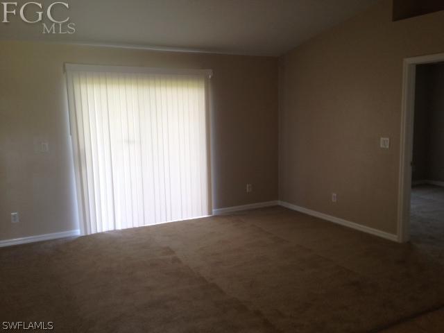 4440 28th Street Southwest Lehigh Acres, FL 33973 - Photo 3 of 4 an empty room with a window