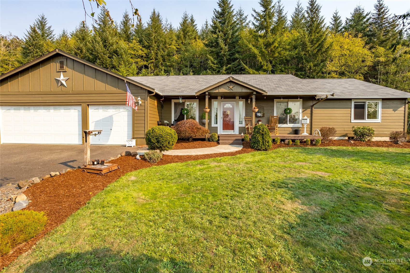 526 Haywire Road Napavine, WA 98532 - Photo 1 of 40 a front view of a house with garden