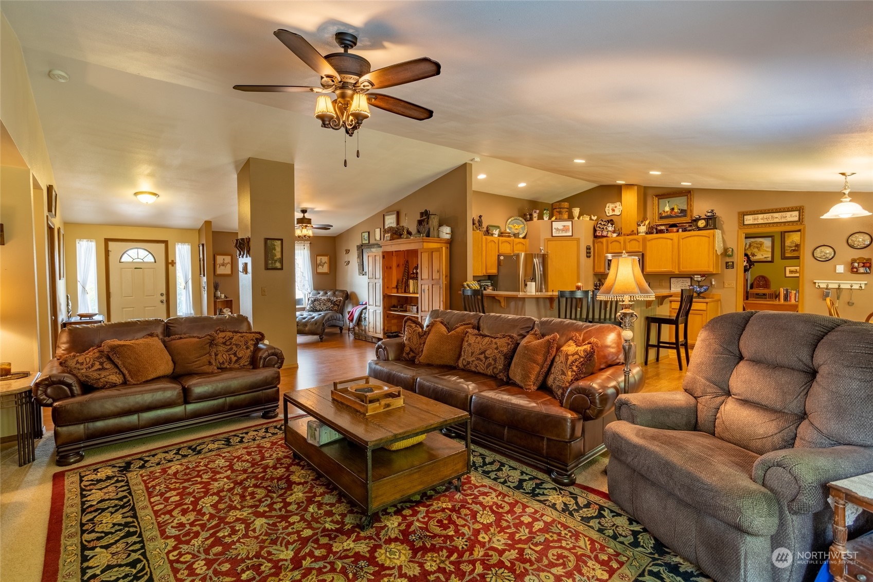 526 Haywire Road Napavine, WA 98532 - Photo 19 of 40 a living room with furniture a ceiling fan and a rug