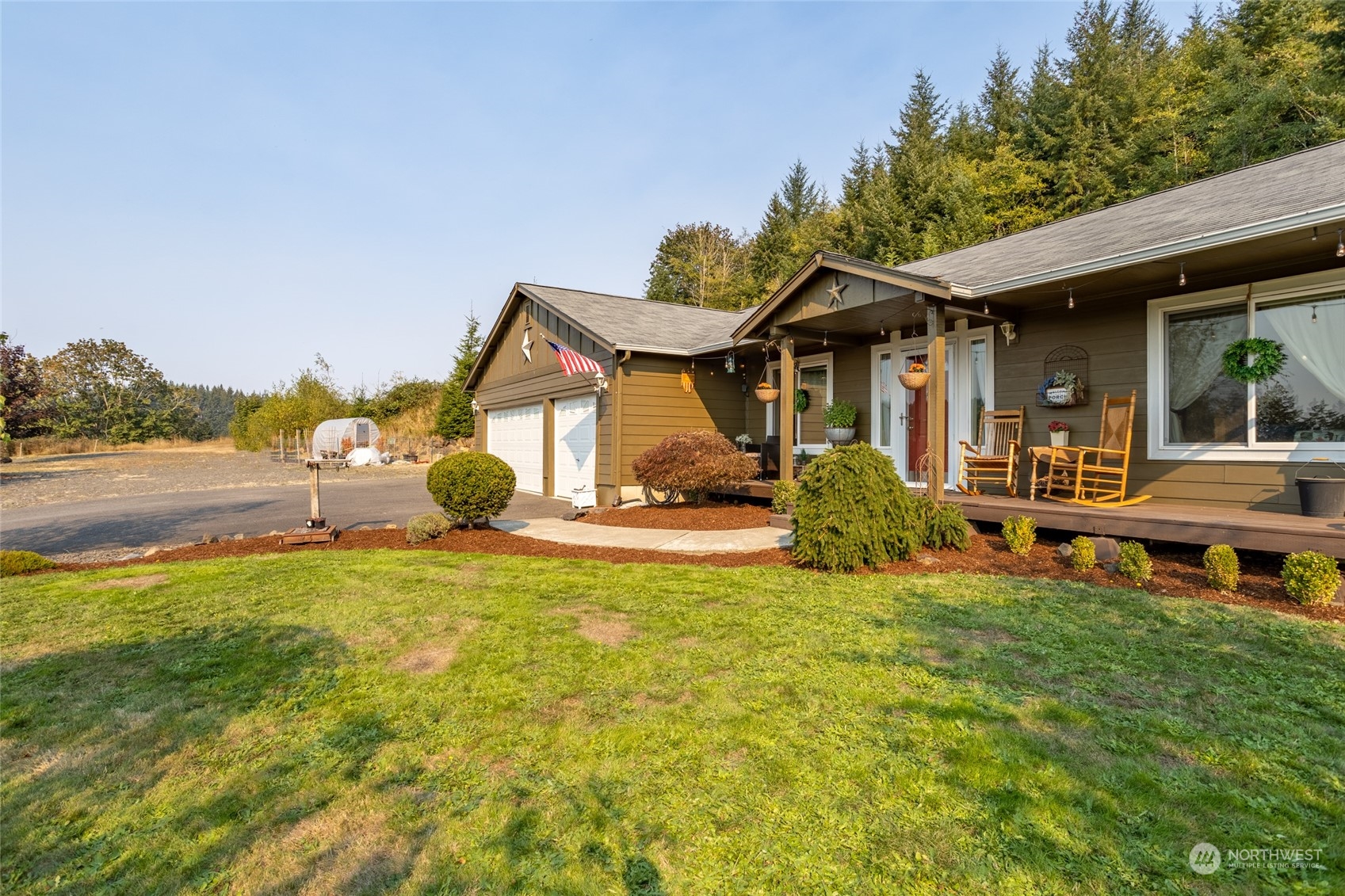 526 Haywire Road Napavine, WA 98532 - Photo 2 of 40 a view of a house with pool and chairs