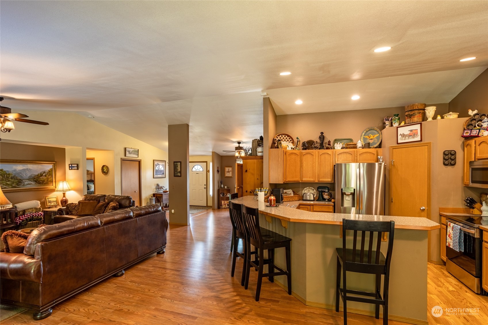 526 Haywire Road Napavine, WA 98532 - Photo 21 of 40 a view of a a dining room with furniture a kitchen and chandelier