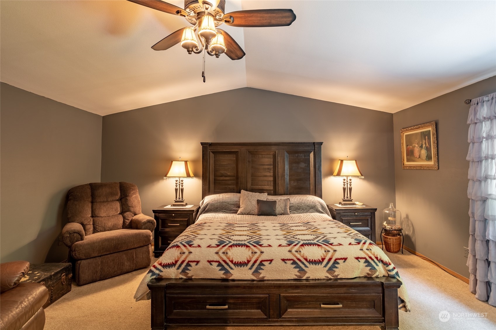 526 Haywire Road Napavine, WA 98532 - Photo 24 of 40 a bedroom with a bed couch and window