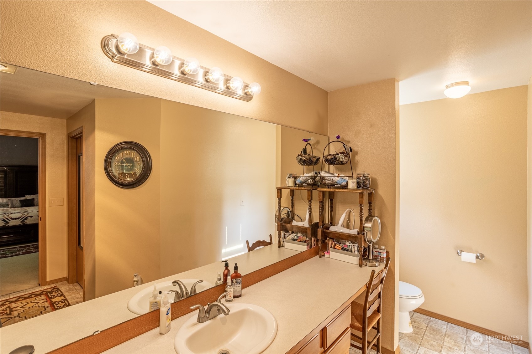 526 Haywire Road Napavine, WA 98532 - Photo 31 of 40 a bathroom with a sink and a mirror