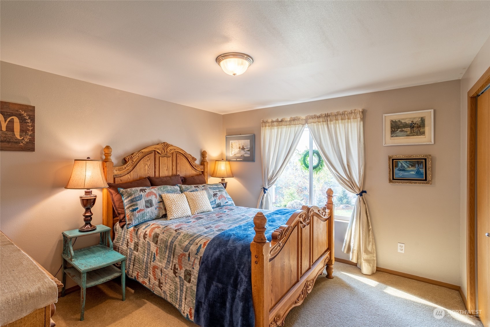 526 Haywire Road Napavine, WA 98532 - Photo 34 of 40 a bed room with a bed and a chair