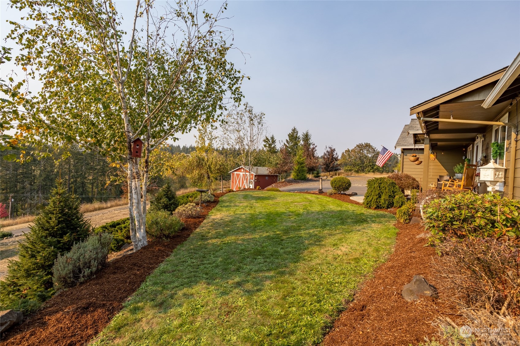 526 Haywire Road Napavine, WA 98532 - Photo 5 of 40 a backyard of a house with lots of green space