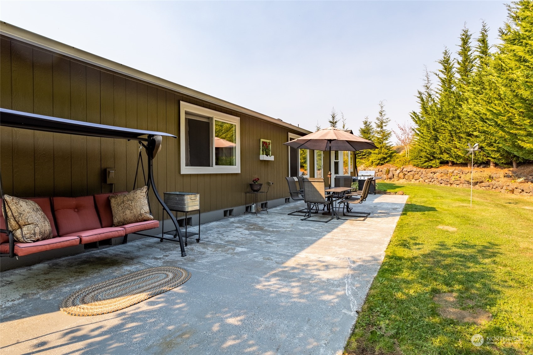 526 Haywire Road Napavine, WA 98532 - Photo 9 of 40 a view of swimming pool with outdoor seating