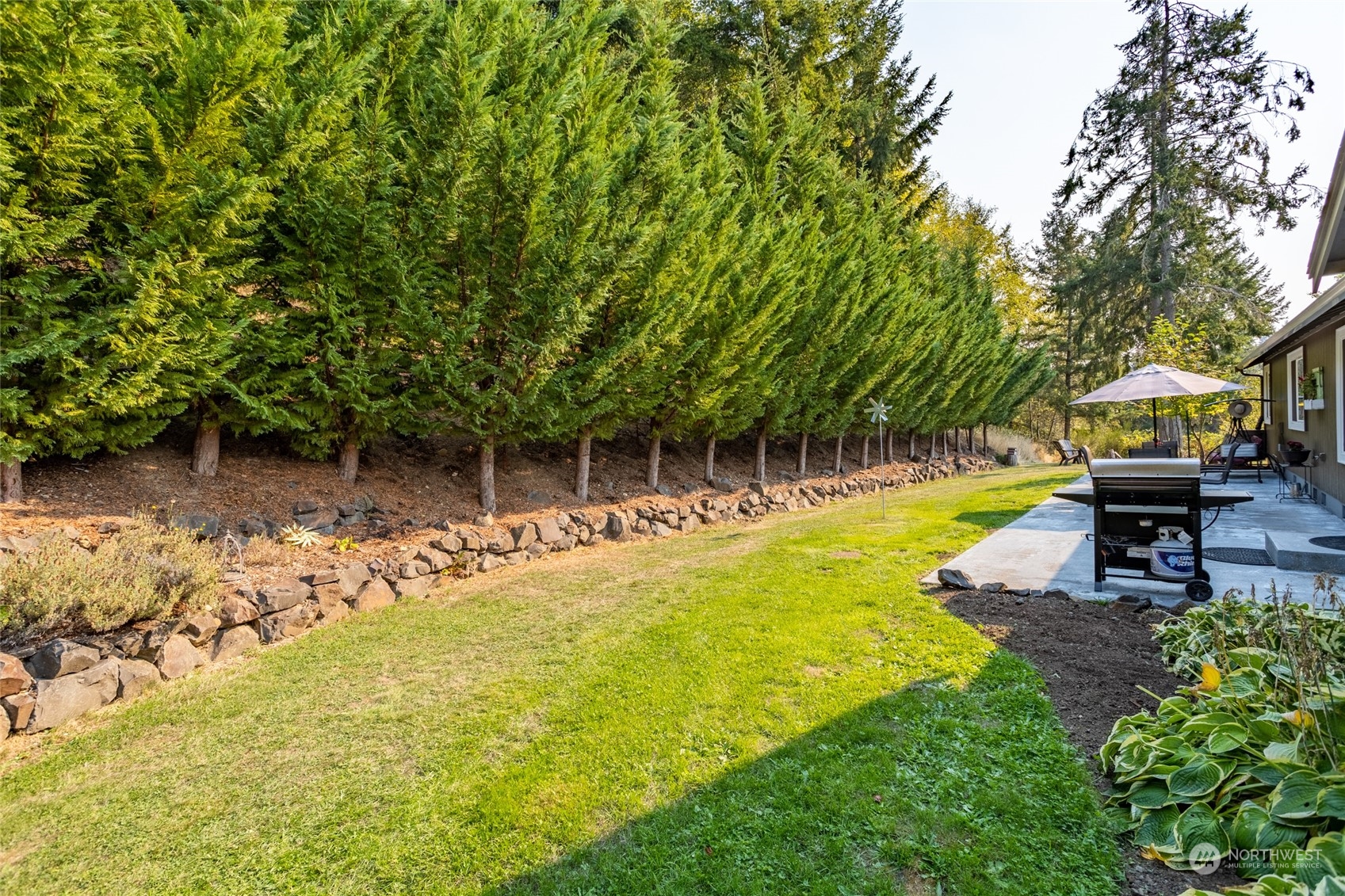 526 Haywire Road Napavine, WA 98532 - Photo 10 of 40 a view of a swimming pool with a patio