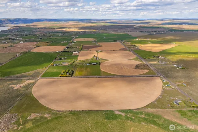 a view of a swimming pool with a yard