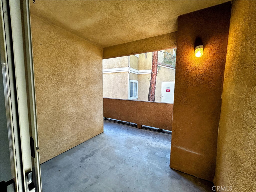 24909 Madison, Unit 111 Murrieta, CA 92562 - Photo 21 of 25 an empty room with windows
