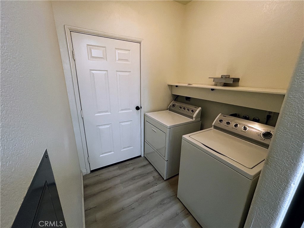 24909 Madison, Unit 111 Murrieta, CA 92562 - Photo 8 of 25 a utility room with dryer and washer