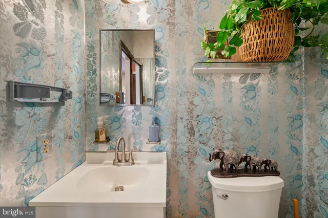 a kitchen filled with stainless steel appliances granite countertop a refrigerator and a stove