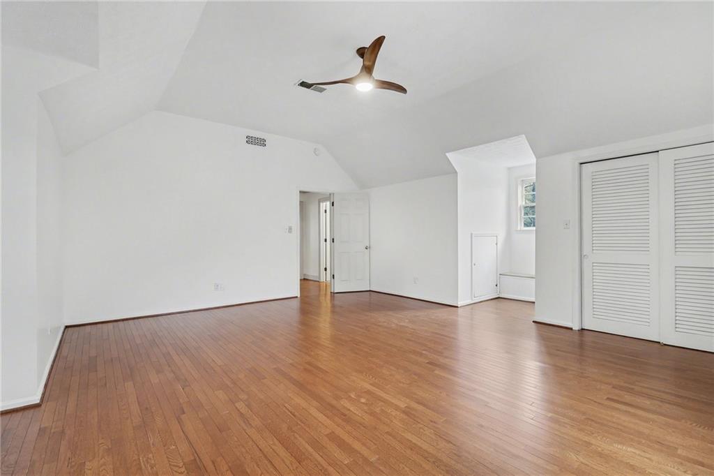 2981 Wilsons Crossing Court Decatur, GA 30033 - Photo 13 of 24 a view of an empty room with wooden floor