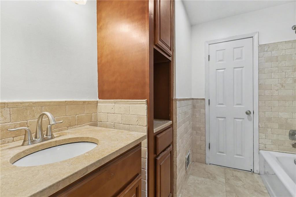 2981 Wilsons Crossing Court Decatur, GA 30033 - Photo 17 of 24 a bathroom with a sink and a mirror