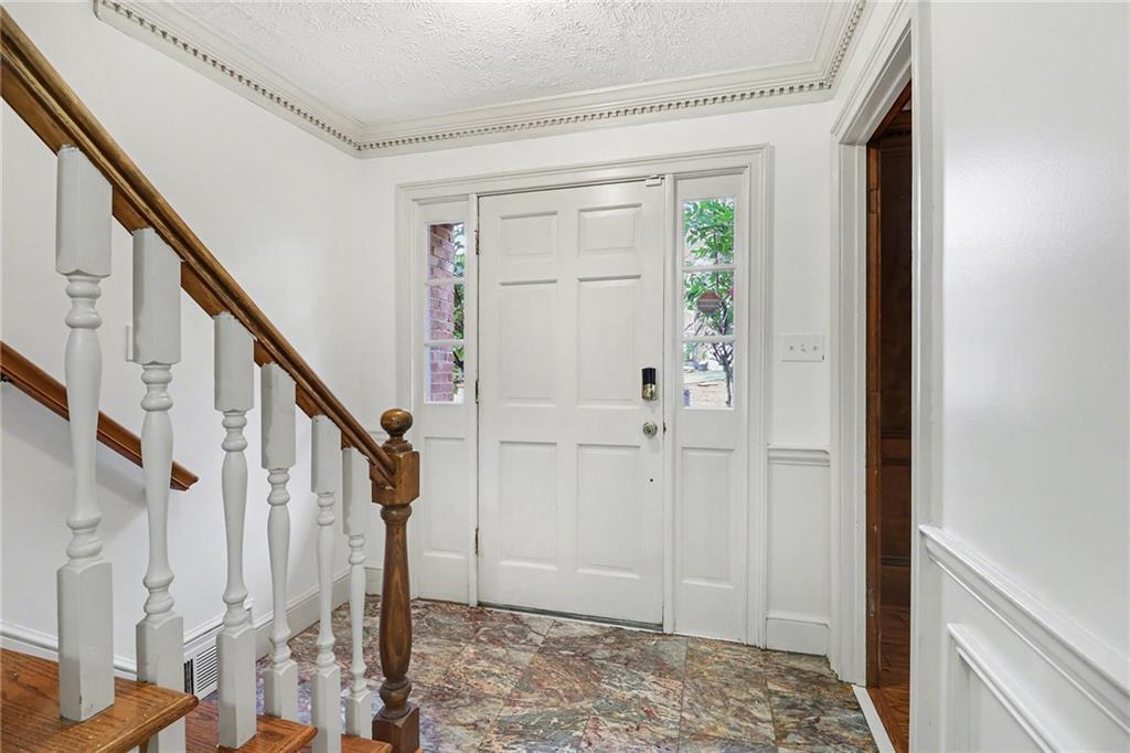 2981 Wilsons Crossing Court Decatur, GA 30033 - Photo 19 of 24 a view of entryway with wooden floor and stair