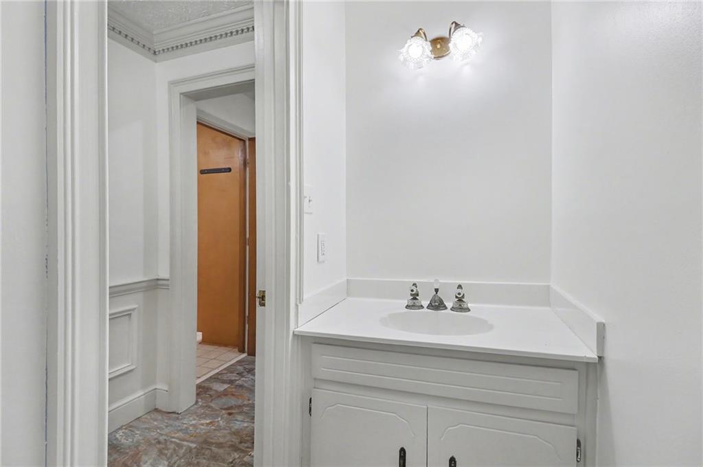 2981 Wilsons Crossing Court Decatur, GA 30033 - Photo 20 of 24 a bathroom with a sink and a mirror