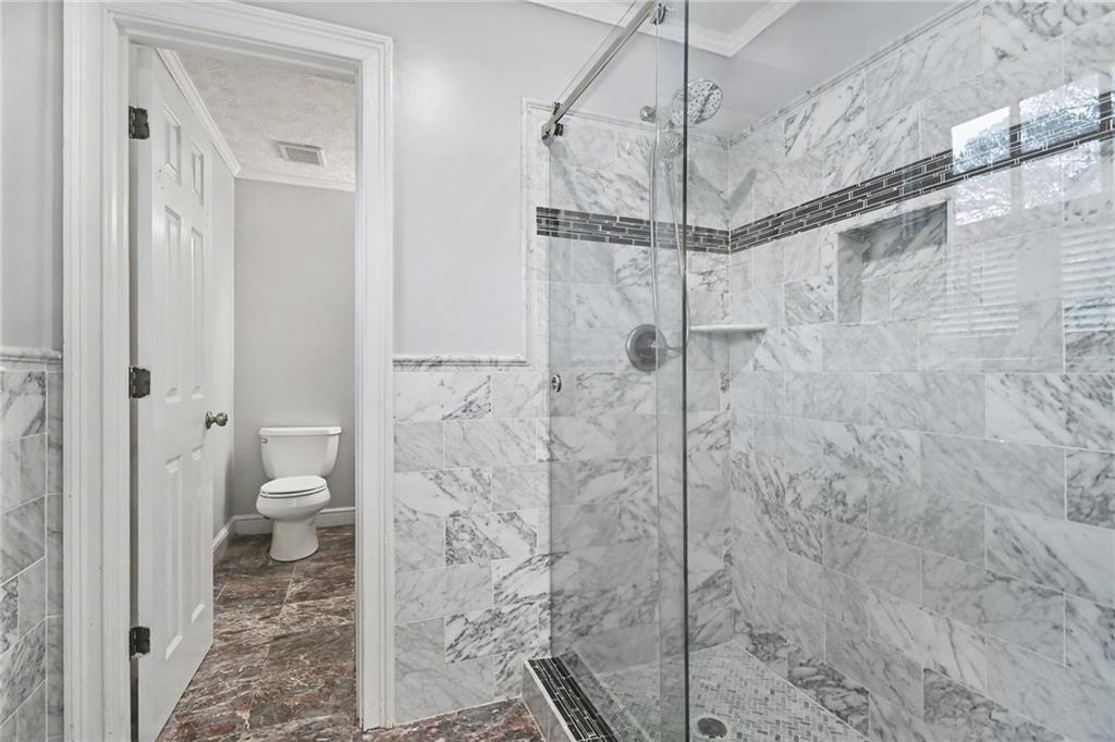 2981 Wilsons Crossing Court Decatur, GA 30033 - Photo 10 of 24 a bathroom with a toilet and a shower