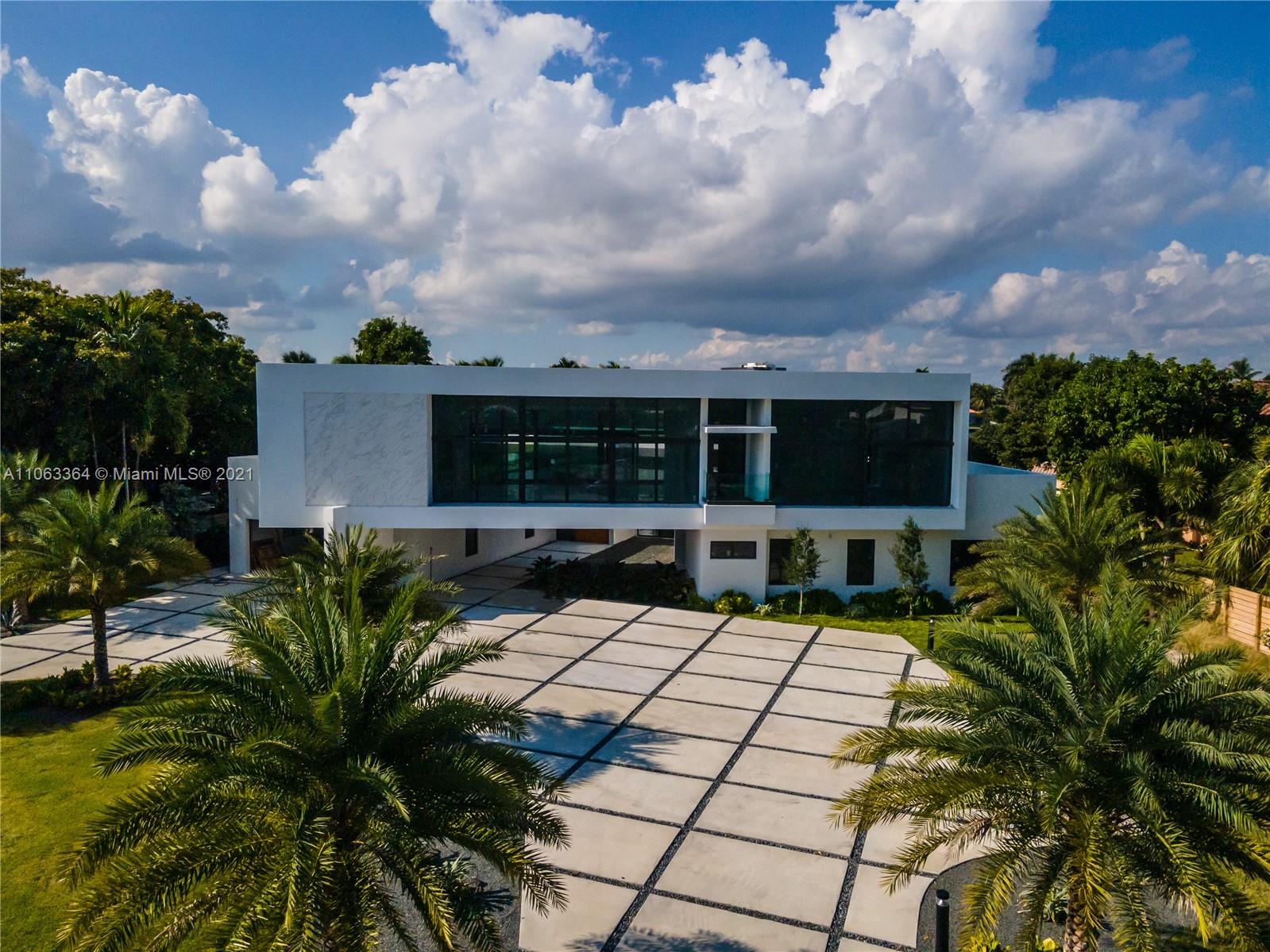 19 Gatehouse Road Sea Ranch Lakes, FL 33308 - Photo 2 of 56 a view of house with outdoor space and seating area