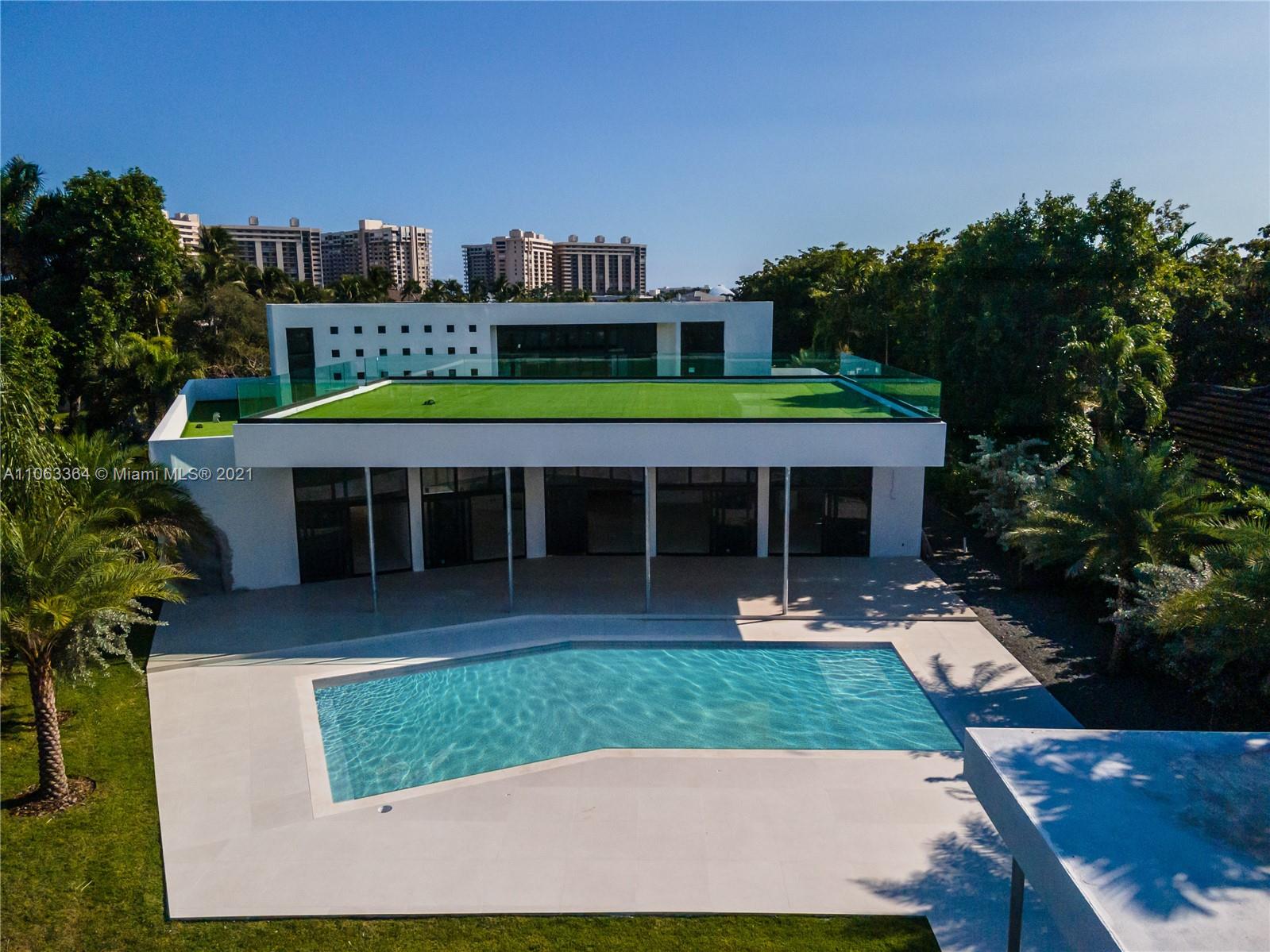 19 Gatehouse Road Sea Ranch Lakes, FL 33308 - Photo 6 of 56 an aerial view of a house with swimming pool garden and patio