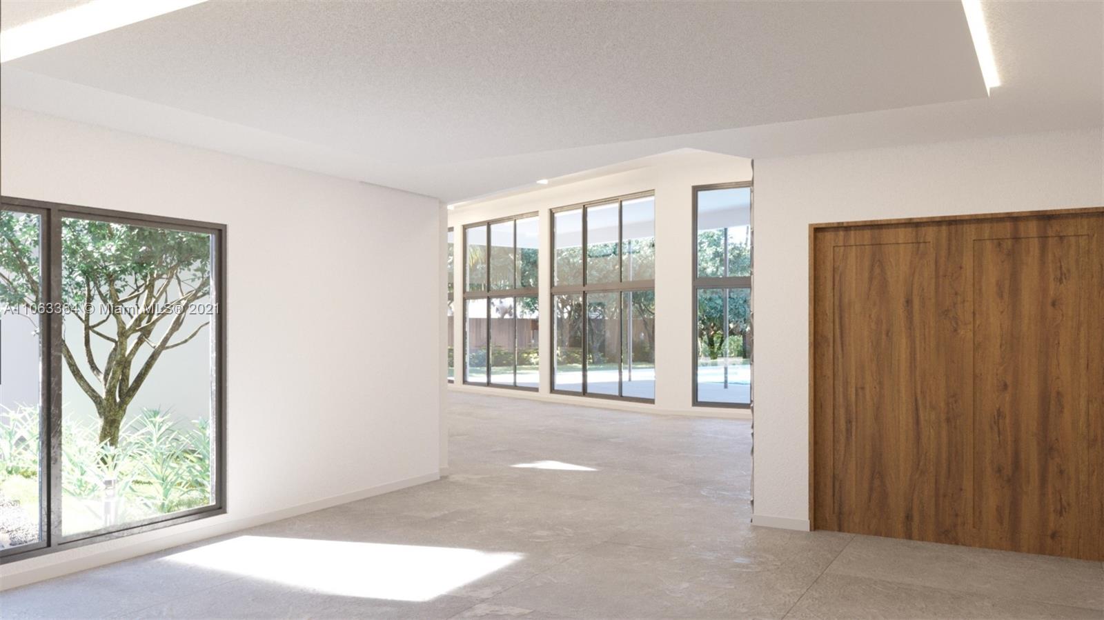19 Gatehouse Road Sea Ranch Lakes, FL 33308 - Photo 7 of 56 a view of a room with a large window
