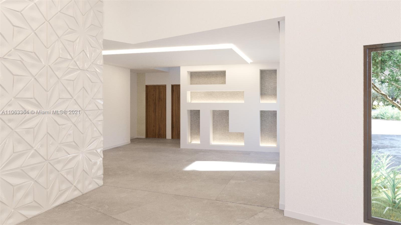 19 Gatehouse Road Sea Ranch Lakes, FL 33308 - Photo 9 of 56 a view of a hallway with wooden floor and a bathroom