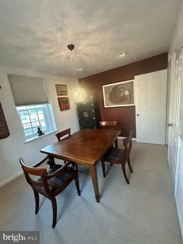 a kitchen with a sink and a stove top oven