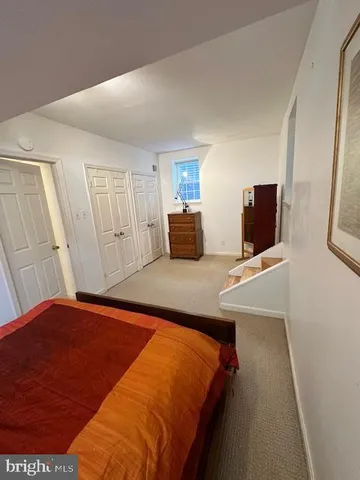 a bathroom with a shower and a toilet