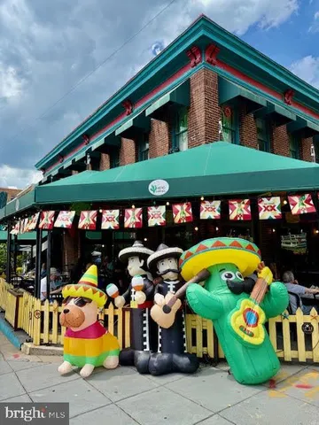 a view of street with sitting area