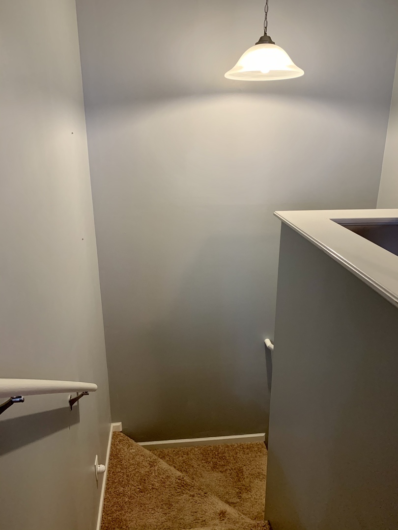 641 Stonegate Drive, Unit 641 Sycamore, IL 60178 - Photo 6 of 13 a bathroom with a shower