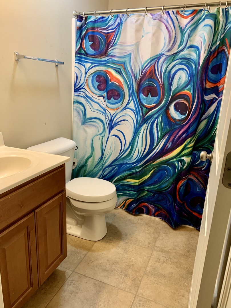 641 Stonegate Drive, Unit 641 Sycamore, IL 60178 - Photo 10 of 13 a bathroom with a sink and a toilet