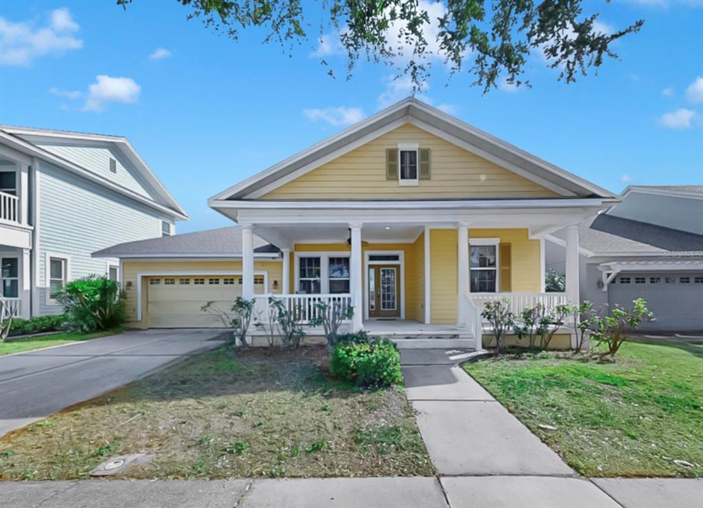 front view of a house with a yard