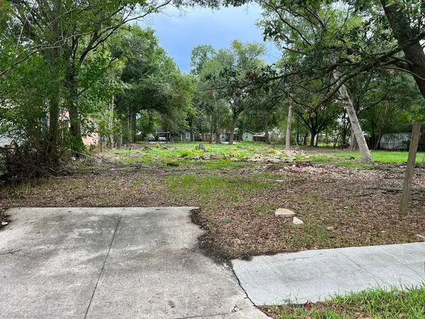 a fire hydrant in the middle of a field