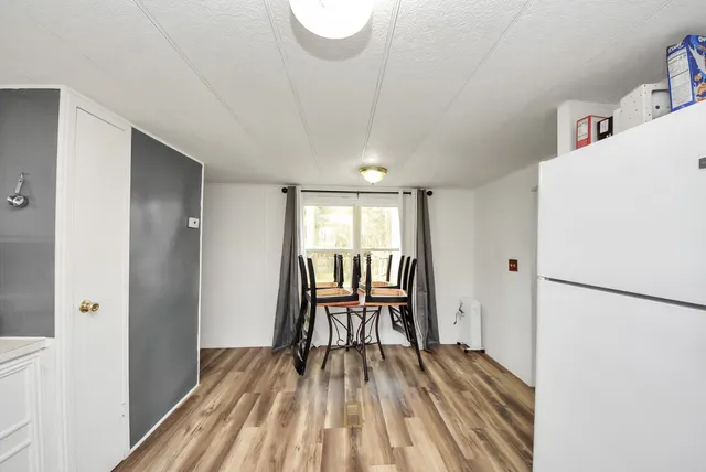 a view of table and chair in a room