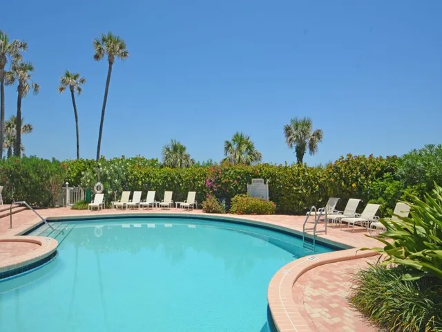 a view of stairs and a potted plant